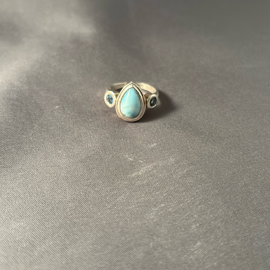 Elegant Silver, Blue Topaz And Larimar Teardrop Ring With Decorative Accents